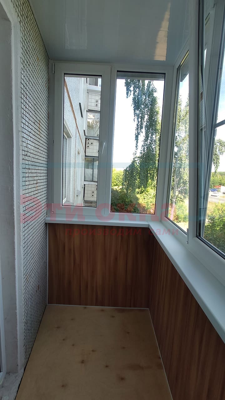 Отделка балкона под ключ от компании Эти Окна по адресу Дзержинского, 56