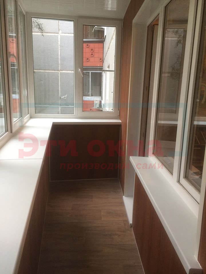 Отделка балкона от компании Эти Окна по адресу Дзержинского, 50