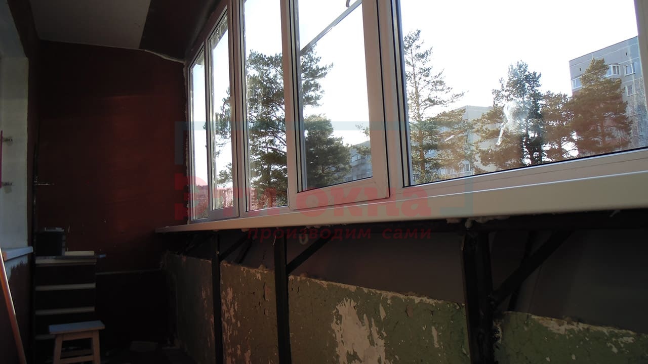 Остекление балкона под ключ от компании Эти Окна выполнено по адресу К. Маркса, 24
